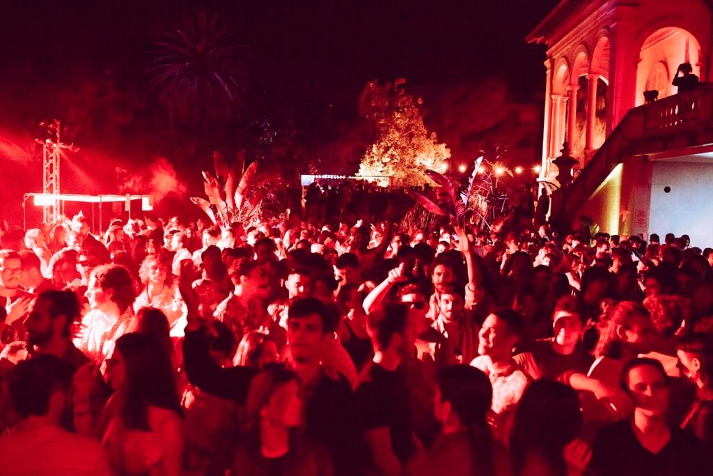 crowd dancing at night at villa ormond in sanremo